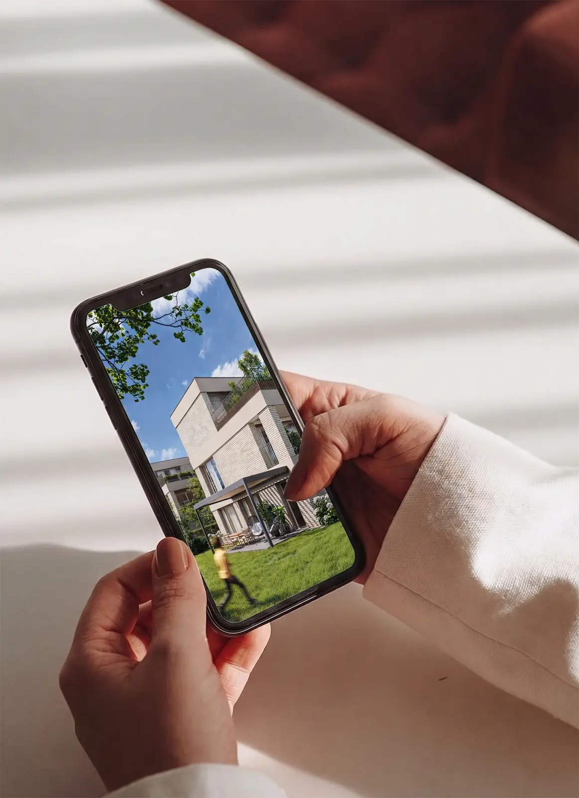 Riverside Nymburk, mockup na mobilním telefonu